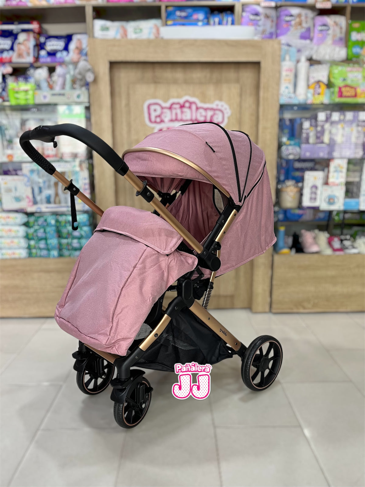 Coche con porta bebe tipo maleta Cova