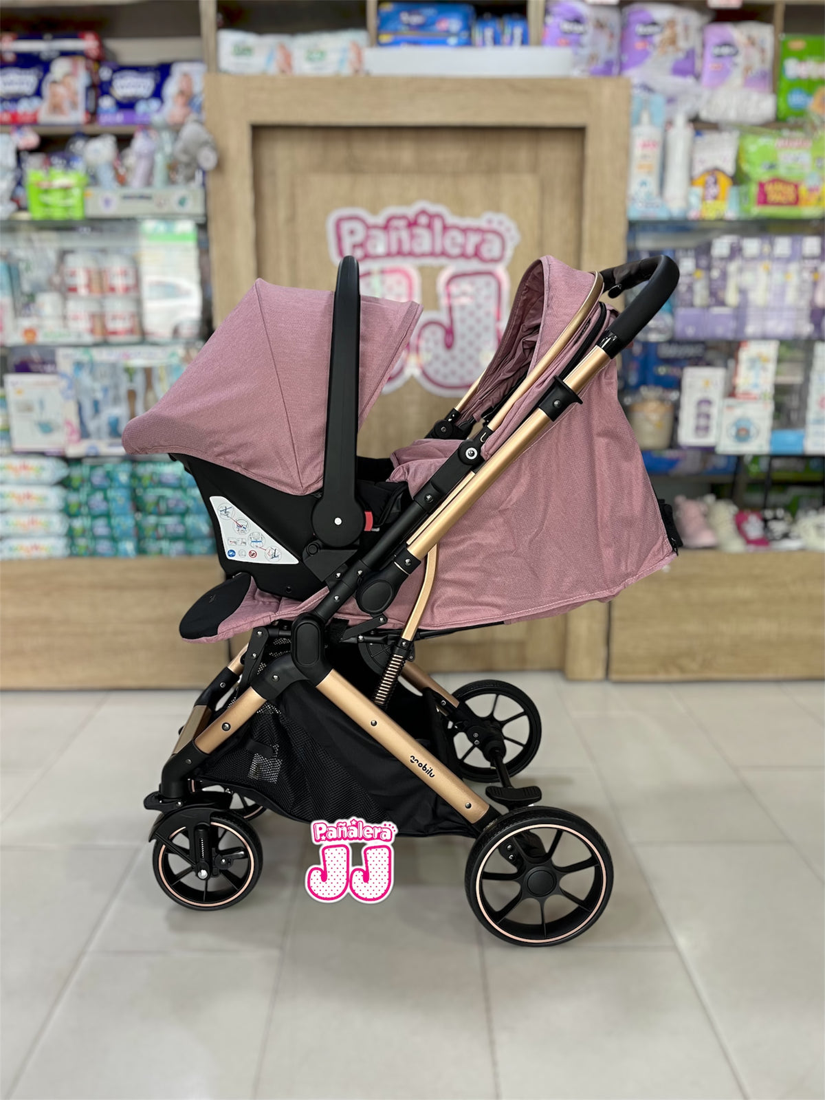 Coche con porta bebe tipo maleta Cova
