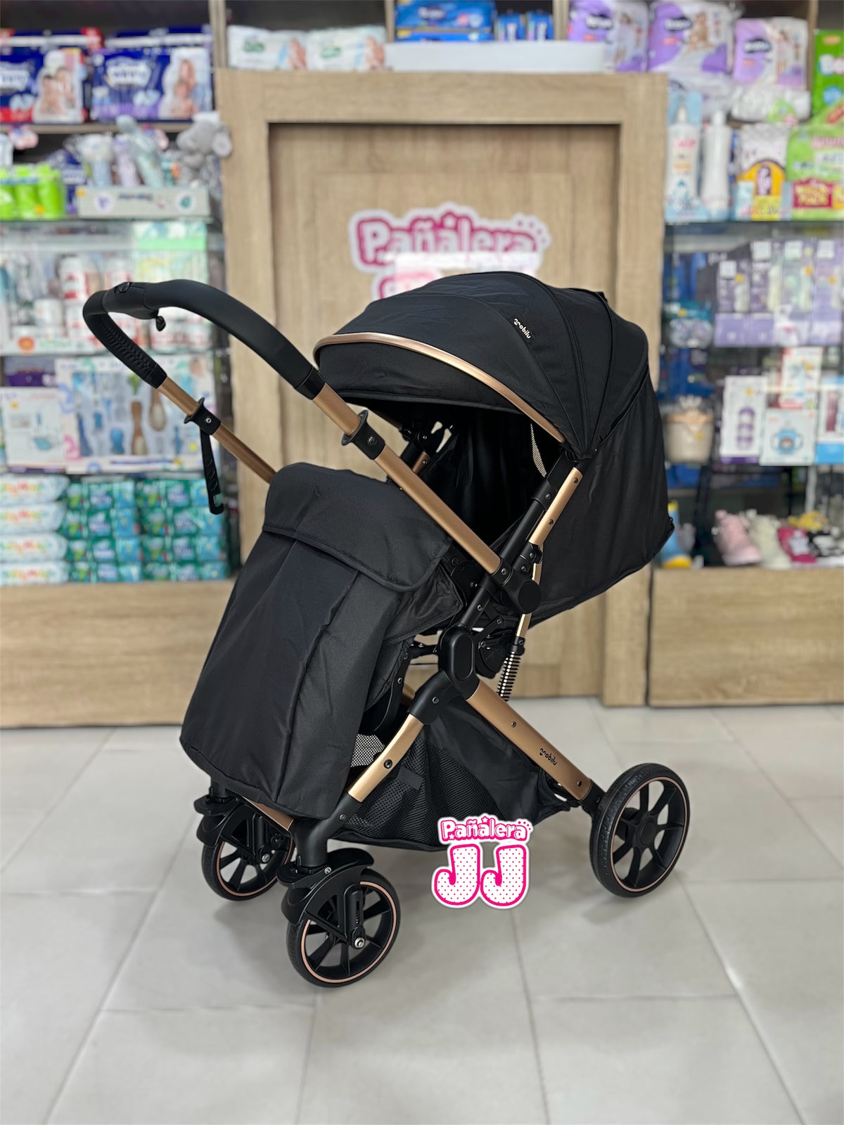 Coche con porta bebe tipo maleta Cova