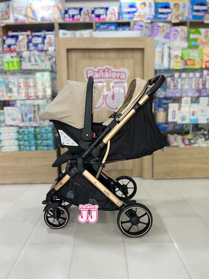 Coche con porta bebe tipo maleta Cova
