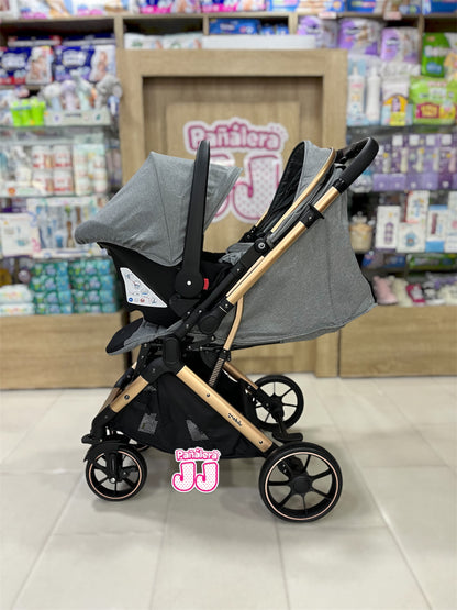Coche con porta bebe tipo maleta Cova