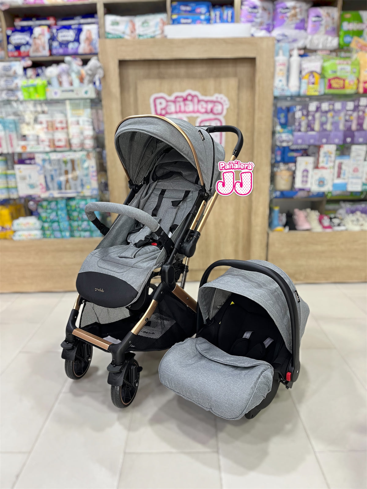 Coche con porta bebe tipo maleta Cova